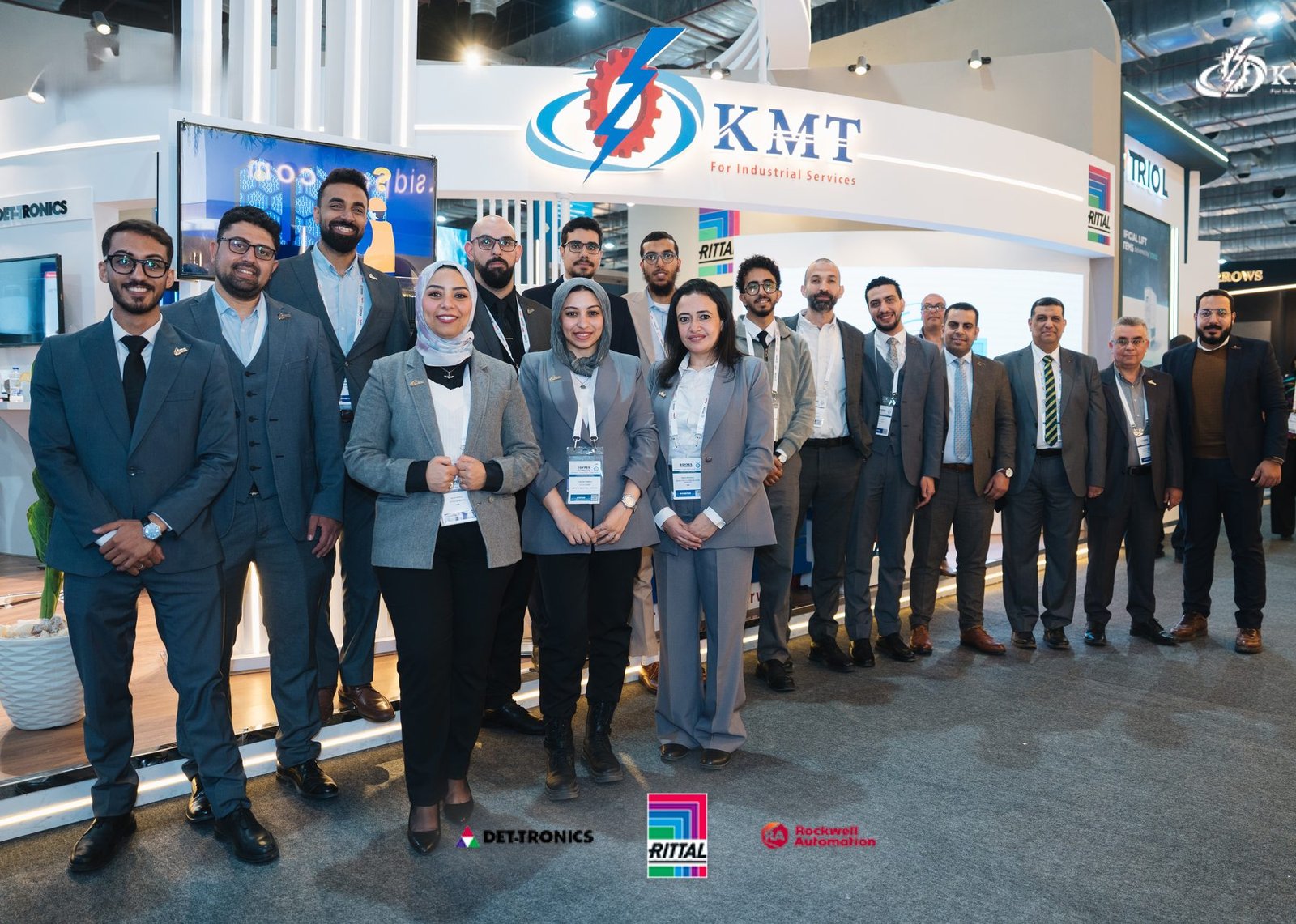 The KMT team at an industry exhibition booth